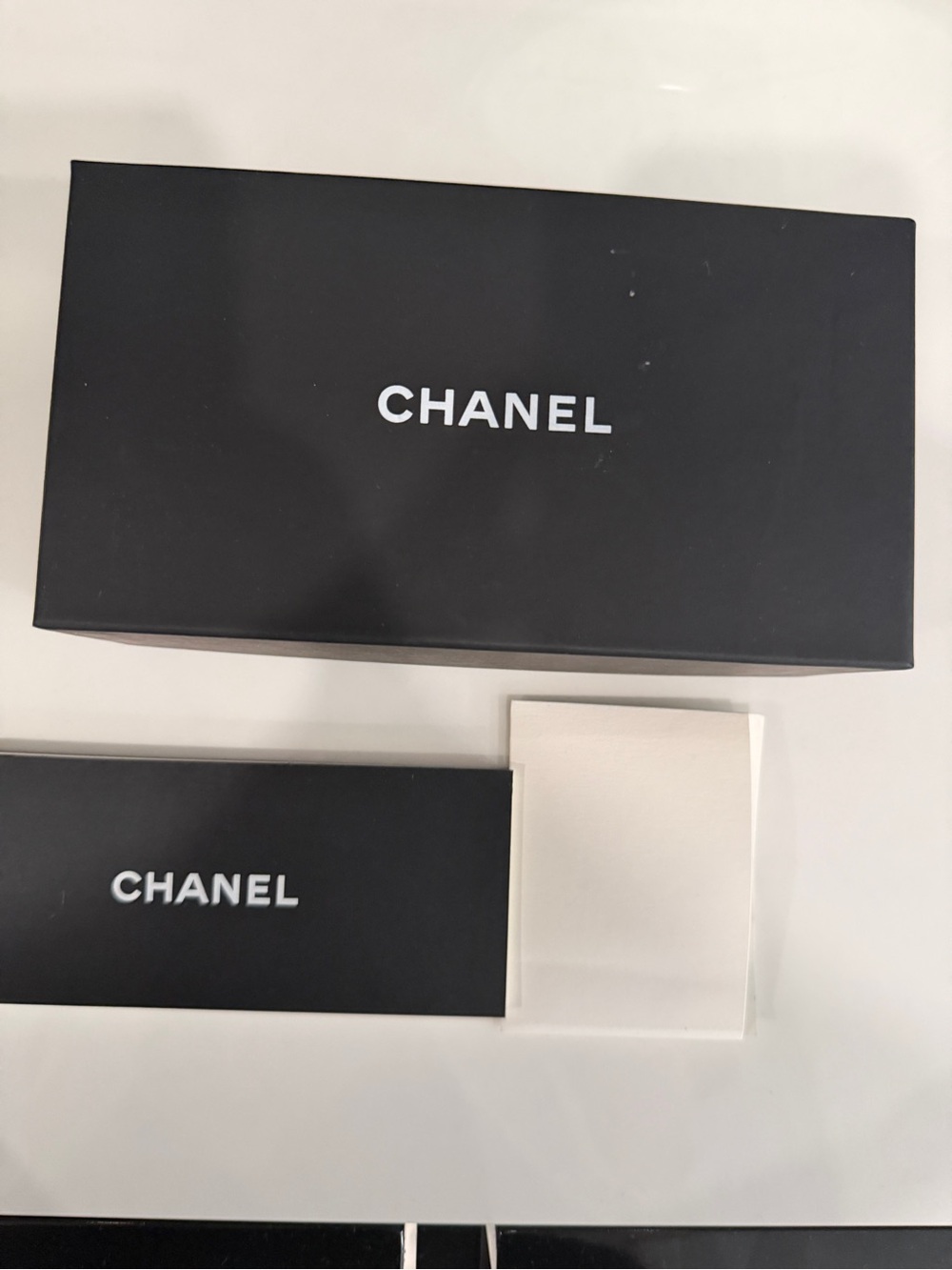 CHANEL Black Glossy Cat-Eye Sunglasses with Logo Accent - Picture 6 of 12